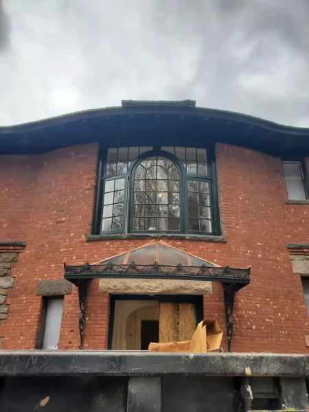 Iron Canopy — Window & Door Restoration — after restoration by Olek Inc.