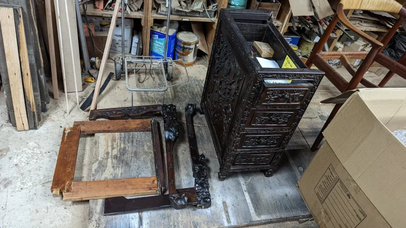 Antique Chinese carved desk after expert damage repair by Olek Inc.